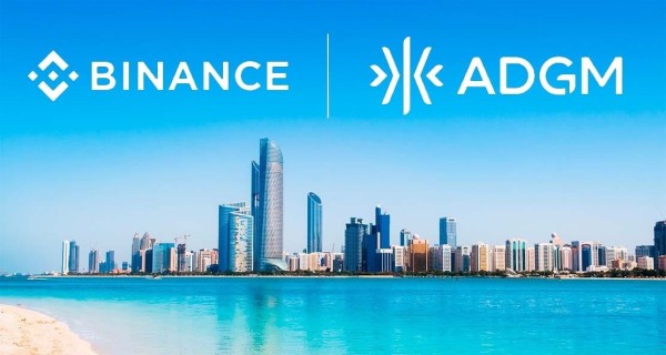Binance and ADGM logos above the Abu Dhabi skyline and waterfront